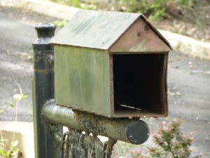 House Mailbox Needs a Door The house shape of this mailbox is really cute.....but a front door would really keep those much anticipated Pottery Barn catalogs from getting wet!